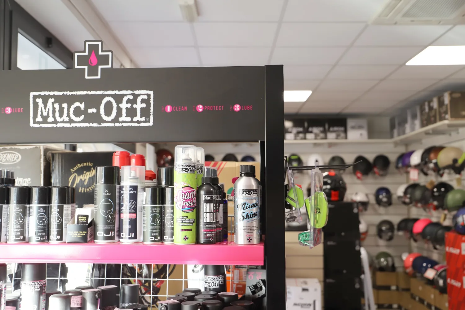 Muc-Off display and helmets